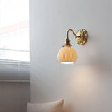 Elegant Brass Ceramic Wall Light with Antique Finish 0