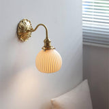 Elegant Brass Ceramic Wall Light with Antique Finish 1
