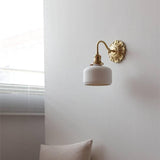 Elegant Brass Ceramic Wall Light with Antique Finish 3