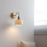 Elegant Brass Ceramic Wall Light with Antique Finish 5