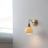 Elegant Brass Ceramic Wall Light with Antique Finish 7
