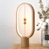 Magnetic LED Balance Lamp - Modern Wireless Table Light 1